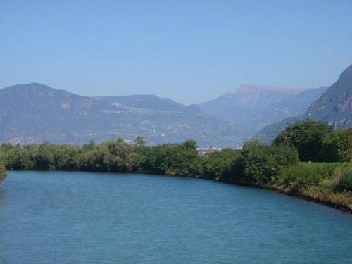 A telephoto view up the river; that is Bozen/Bolzano over the trees.